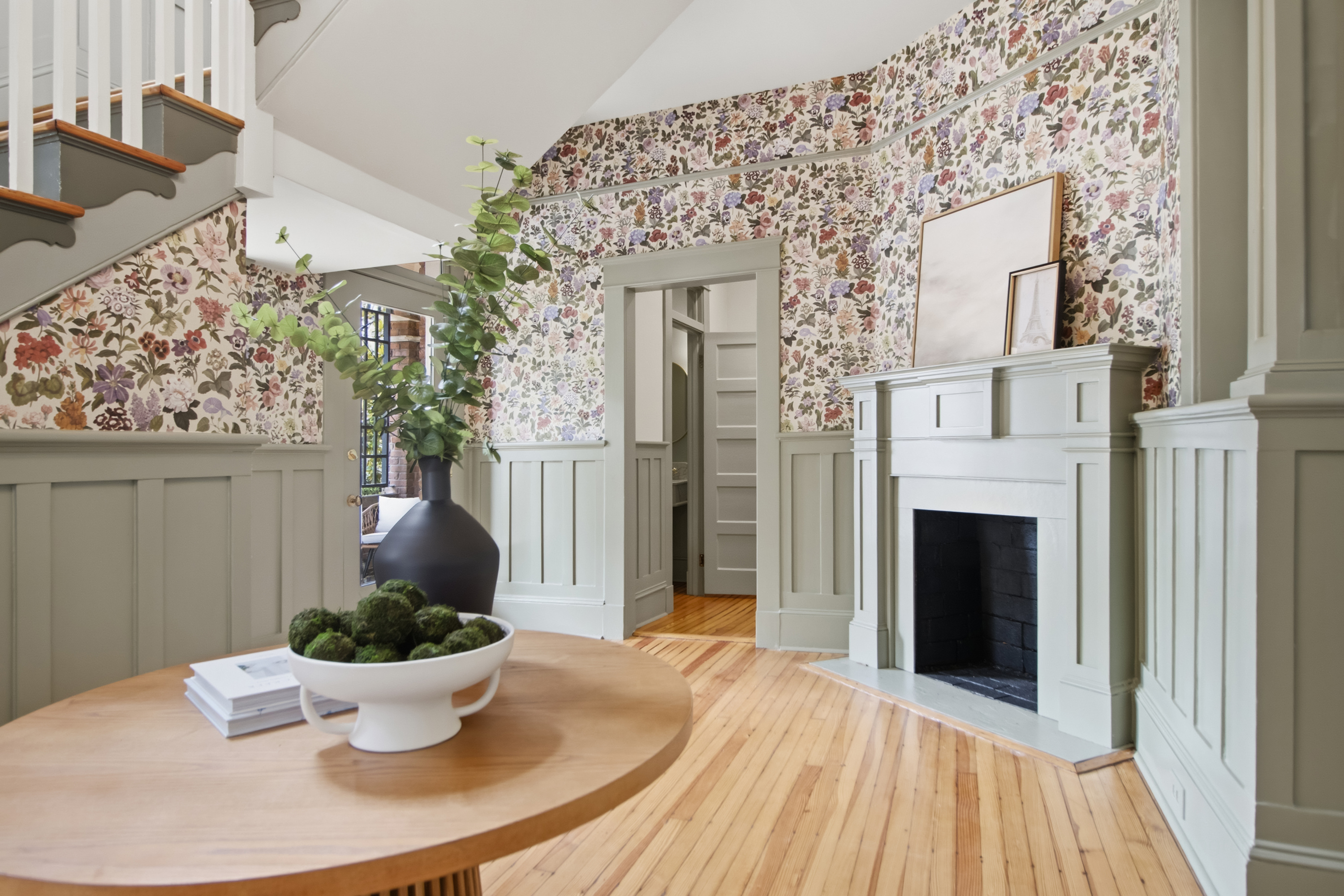Boxed newel staircase, oak floors, and period millwork